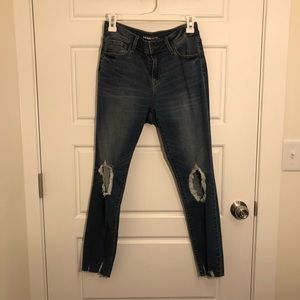 Ripped knee distressed hem blue jeans